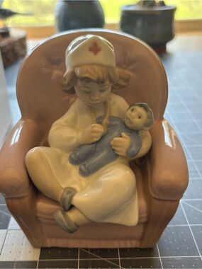 Lladro Nao Porcelain “Playing Nurse” figurine